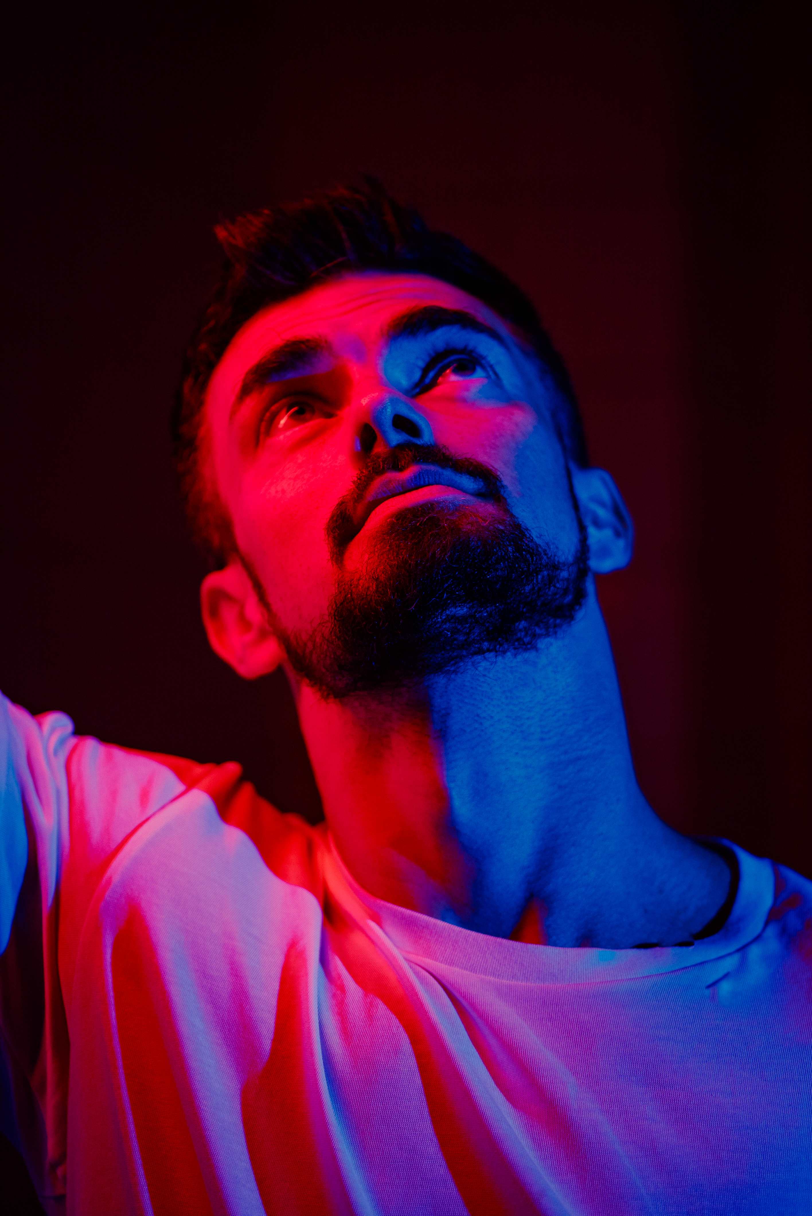 Dramatic red and blue lit portrait shot at Film Büro studio