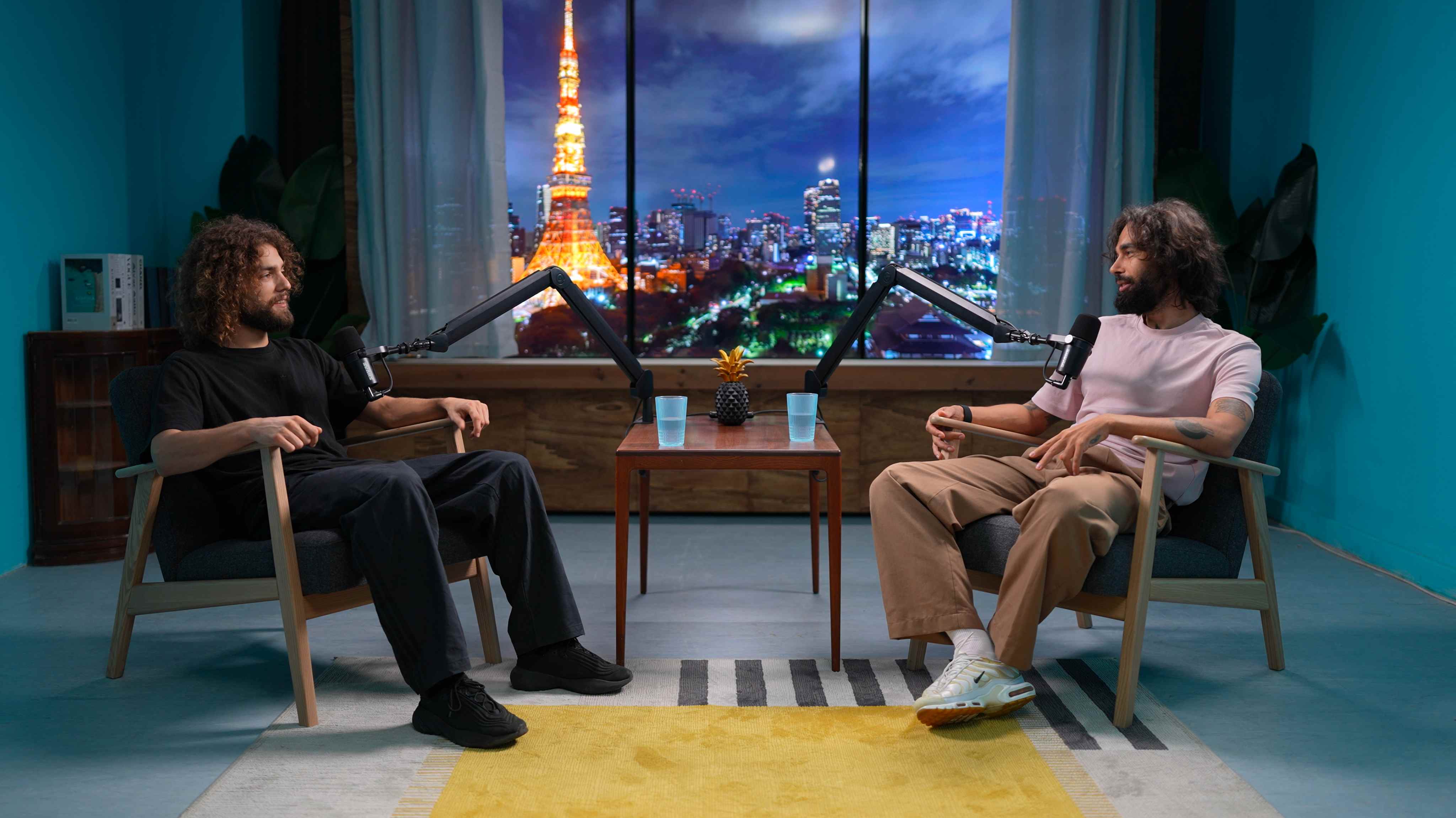 Video podcast studio Lisbon with Tokyo night cityscape background