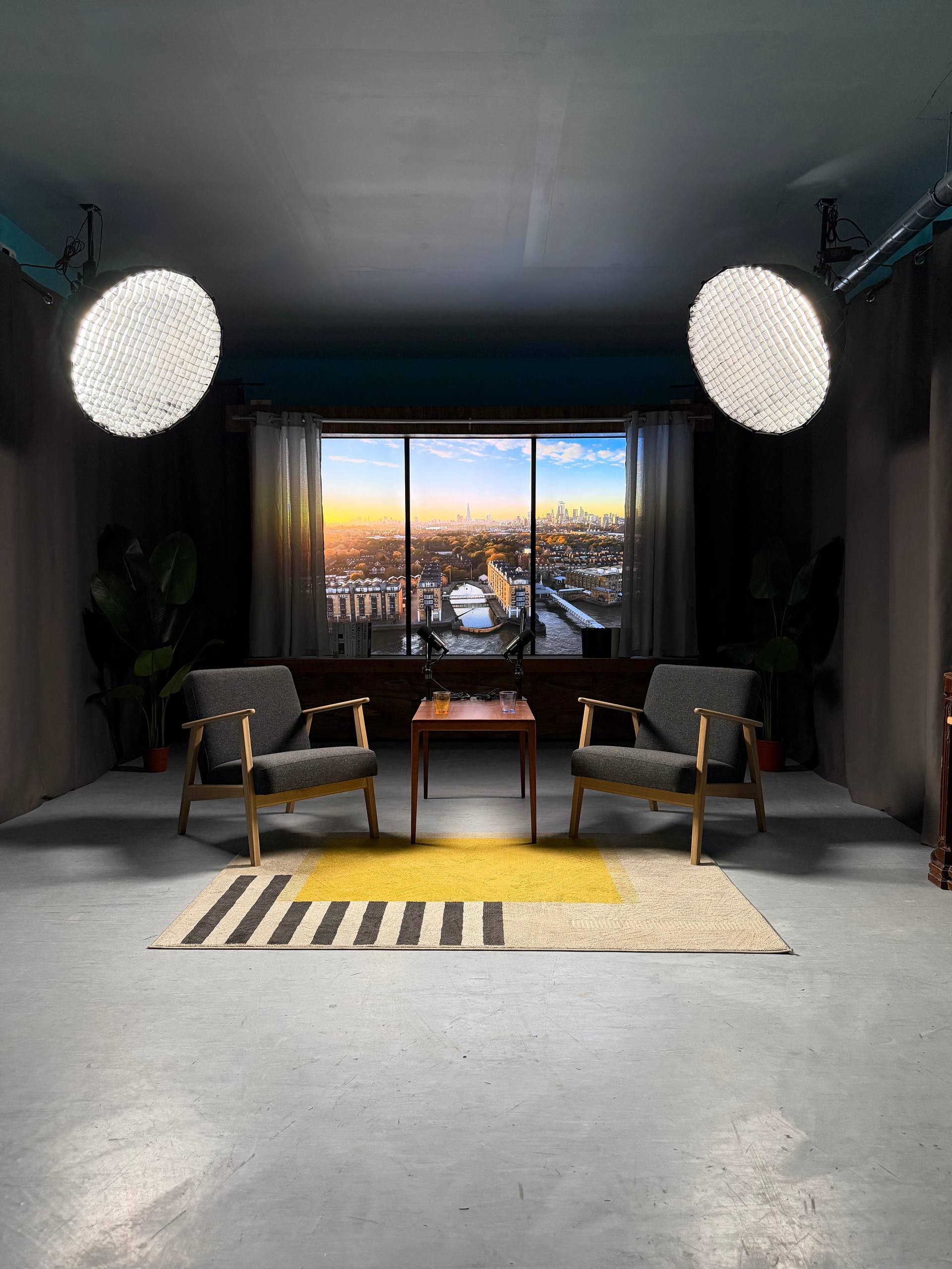 Film Büro Lisbon studio rental with London sunset cityscape on Infinite Digital Window