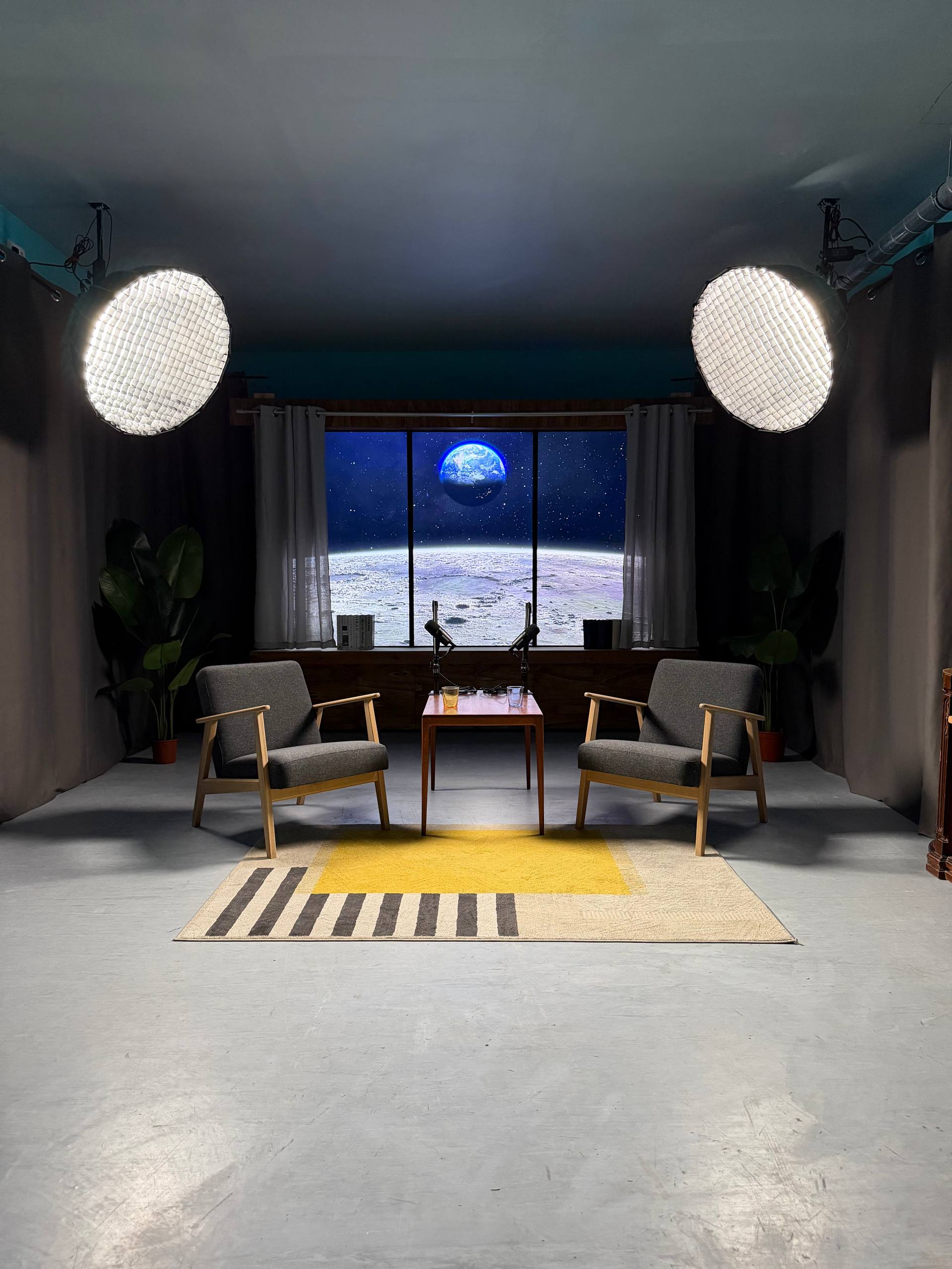 Professional studio space for rent in Lisbon with Earth-from-moon space background