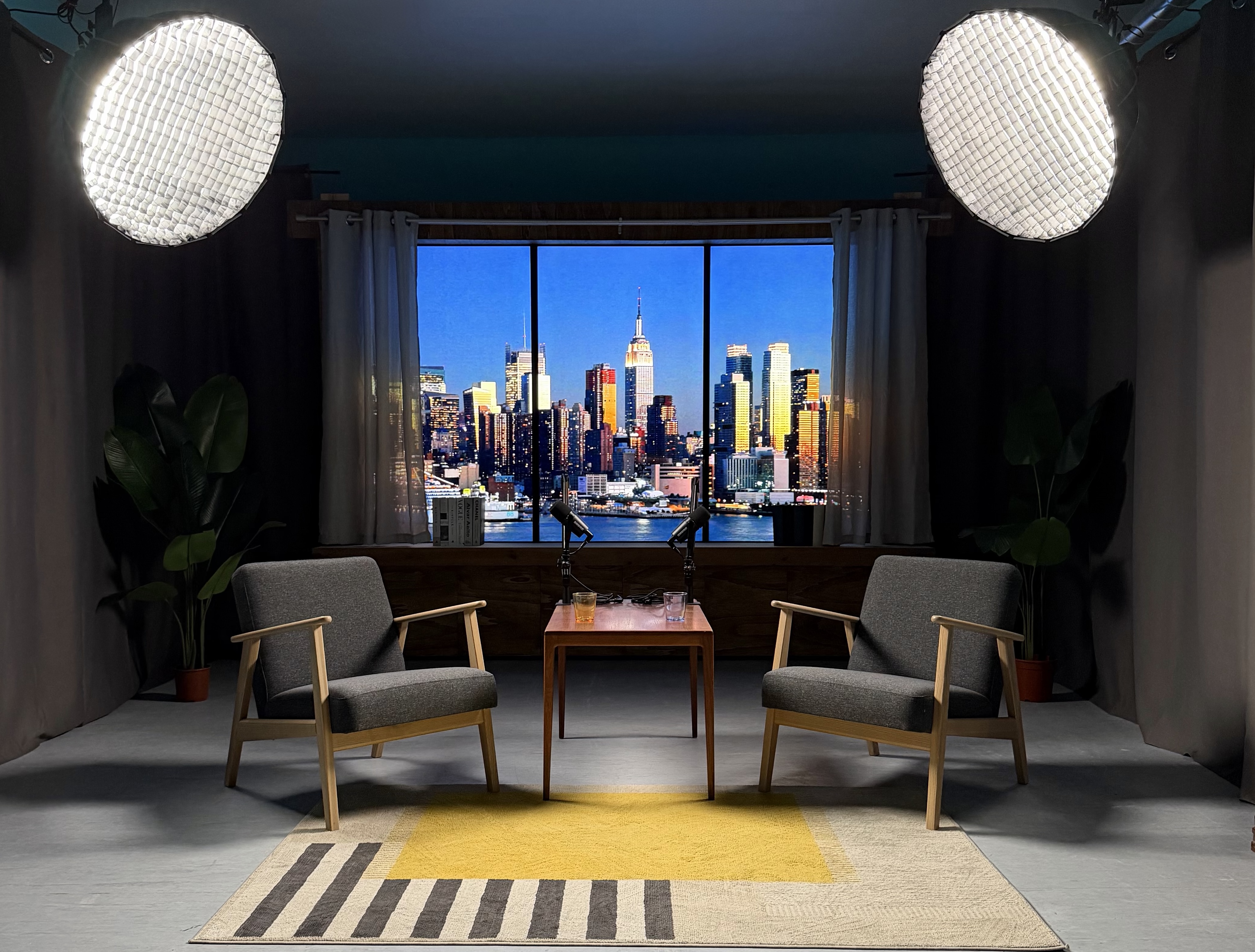 Professional video studio rental in Lisbon with NYC panoramic background and professional lighting