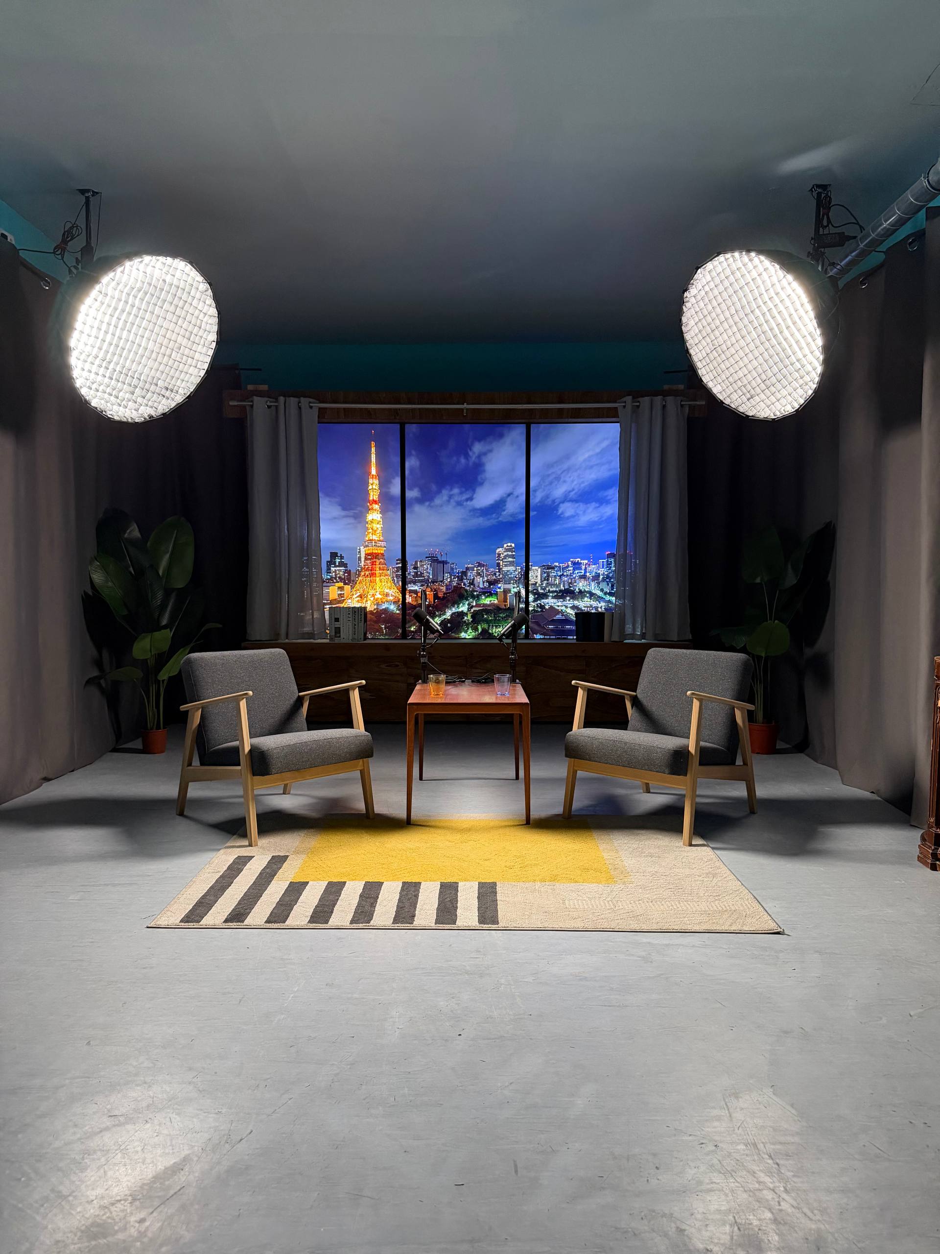 Film Büro studio rental in Lisbon with Tokyo Tower night skyline on Infinite Digital Window